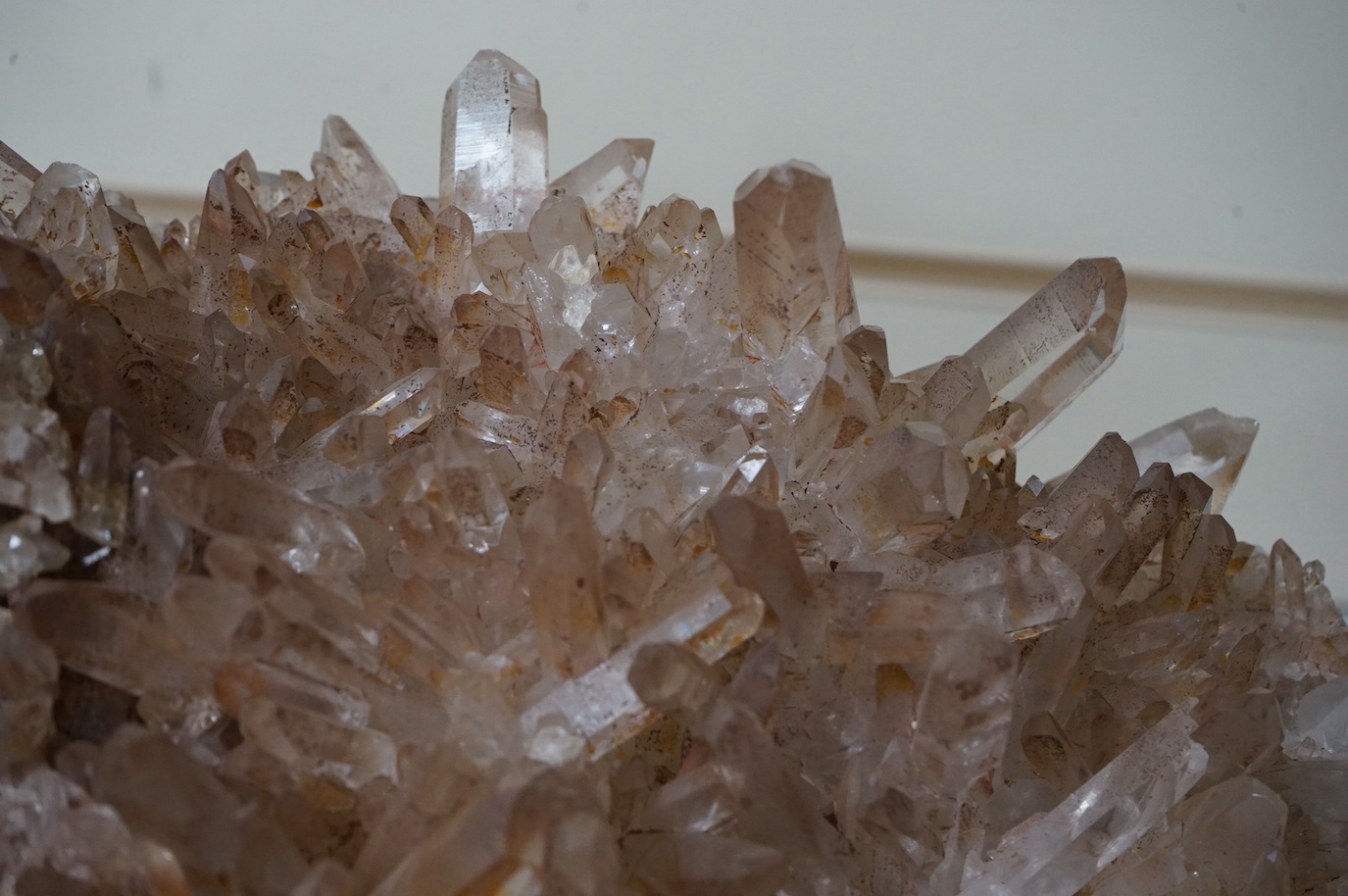 A large quartz specimen on bespoke chrome stand, stand 32cm wide x 26cm deep. Quartz 28cm wide x 27cm deep